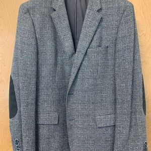 Hugo Boss 44R.  Grey pattern with faint blue lines.